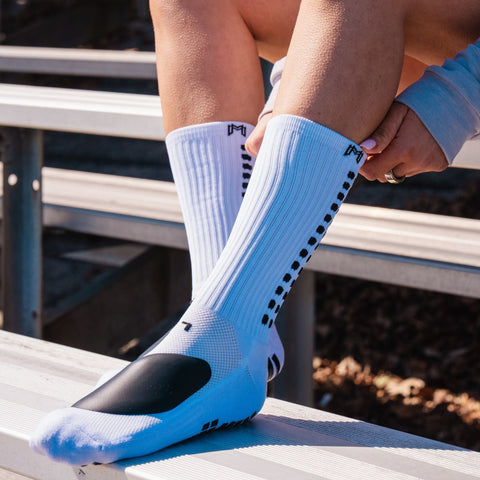 Grip Socks by Position: What Defenders, Midfielders, Wingers, and Keepers Need